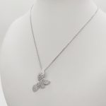 Ezüst nyaklánc szikrázó virág medállal