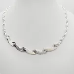 Ezüst elől szélesedő metszett nyakék
