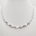 Ezüst elől szélesedő metszett nyakék