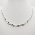 Ezüst elől szélesedő metszett nyakék