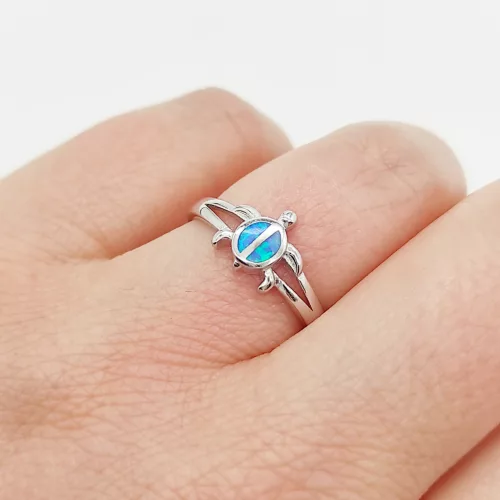 Ezüst teknős gyűrű kék opállal