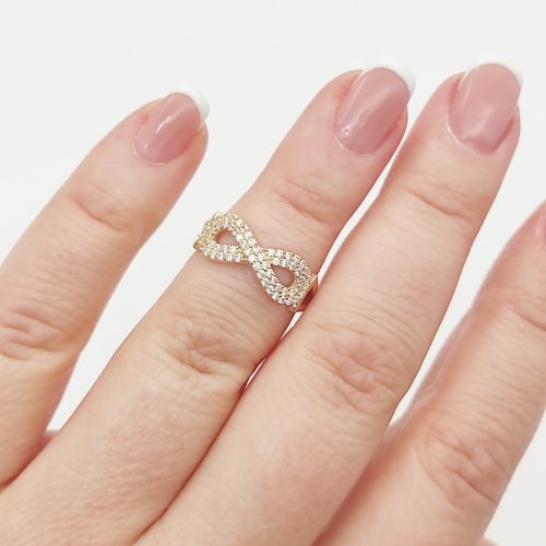 Sárga arany gyűrű szikrázó végtelennel