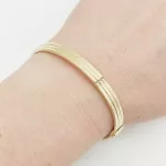 Sárga arany széles mutatós karperec