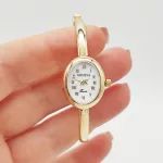 Sárga arany női karperec óra