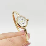 Sárga arany női karperec óra