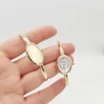 Sárga arany női karperec óra