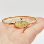 Sárga arany női karperec óra