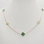 Sárga arany nyaklánc zöld lóherékkel