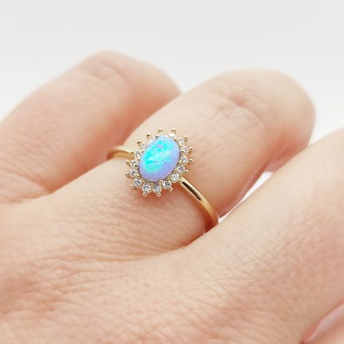 Sárga arany gyűrű kék opállal