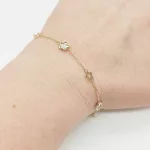 Sárga arany metszett virágos karlánc