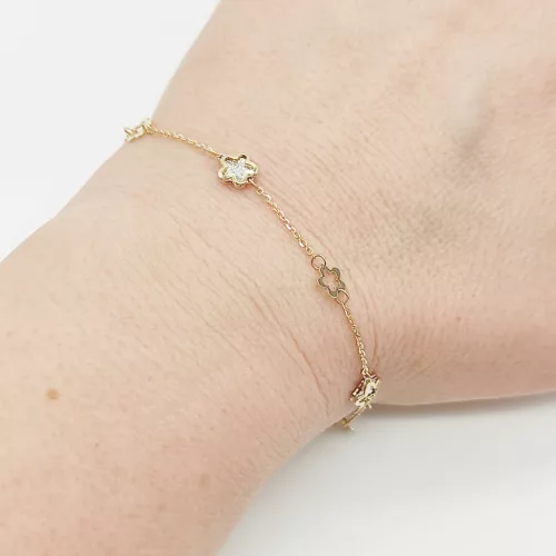 Sárga arany metszett virágos karlánc