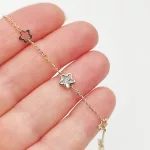 Sárga arany metszett virágos karlánc