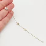 Sárga arany metszett virágos karlánc