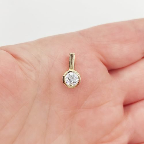 Sárga arany egy köves buttonos medál