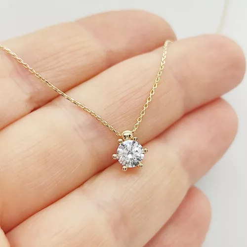 Sárga arany nyaklánc egy köves 6 karmos medállal