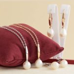 Rozé arany lógós fülbevaló nagy gyönggyel