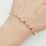 Sárga arany csavart karperec