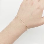 Sárga arany kis metszett bogyós karperec