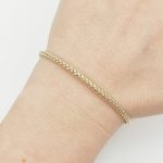 Sárga arany modern mintás karperec