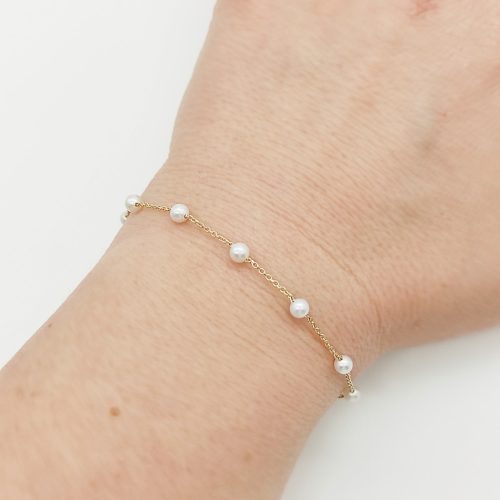 Sárga arany karlánc gyöngyökkel