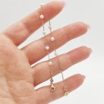 Sárga arany karlánc gyöngyökkel