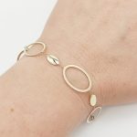 Sárga arany modern karikás karlánc