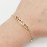 Sárga arany modern köves karlánc