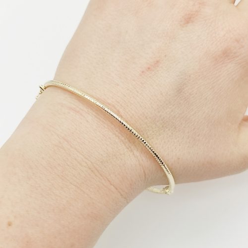 Sárga arany metszett karperec