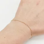 Sárga arany karlánc apró cirkóniákkal