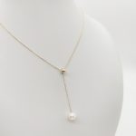 Sárga arany nyaklánc gyöngy medállal