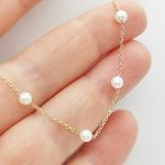 Sárga arany nyaklánc apró gyöngyökkel