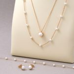 Sárga arany nyaklánc apró gyöngyökkel