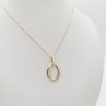 Sárga arany nyaklánc modern medállal