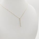 Sárga arany nyaklánc köves pálcika medállal