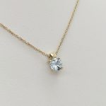 Sárga arany nyaklánc világoskék cirkóniával