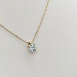 Sárga arany nyaklánc világoskék cirkóniával