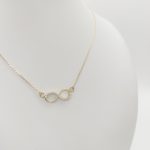 Sárga arany nyaklánc köves végtelen medállal