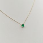 Sárga arany nyaklánc zöld köves medállal