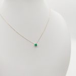 Sárga arany nyaklánc zöld köves medállal