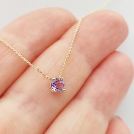 Sárga arany nyaklánc lila köves medállal