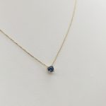 Sárga arany nyaklánc kék köves medállal