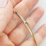 Sárga arany mutatós merev omegalánc