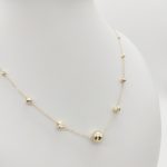 Sárga arany nyaklánc bogyókkal