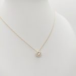 Sárga arany nyaklánc szikrázó medállal