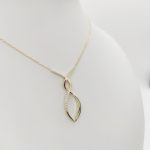 Sárga arany nyaklánc modern medállal