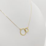 Sárga arany nyaklánc dupla karika medállal