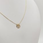 Sárga arany nyaklánc áttört életfa medállal