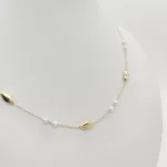 Sárga arany nyaklánc gyöngyökkel