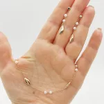 Sárga arany nyaklánc gyöngyökkel