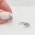 Fehér arany kis csavart fülbevaló